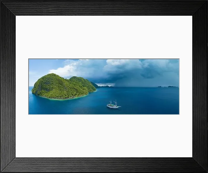 Framed Print : Coral reefs surround the dramatic limestone islands that have been uplifted from Raja Ampat's beautiful and biodiverse seascape Framed Print : Coral reefs surround the dramatic limestone islands that have been uplifted from Raja Ampat's beautiful and biodiverse seascape