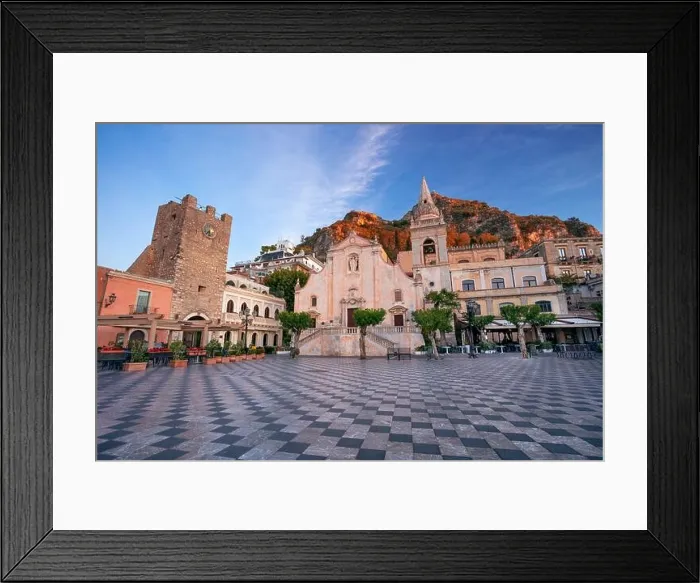 Framed Print : Taormina, Sicily, Italy. Cityscape image of picturesque town of Taormina, Sicily with main square Piazza IX Aprile and San Giuseppe church at sunrise Framed Print : Taormina, Sicily, Italy. Cityscape image of picturesque town of Taormina, Sicily with main square Piazza IX Aprile and San Giuseppe church at sunrise