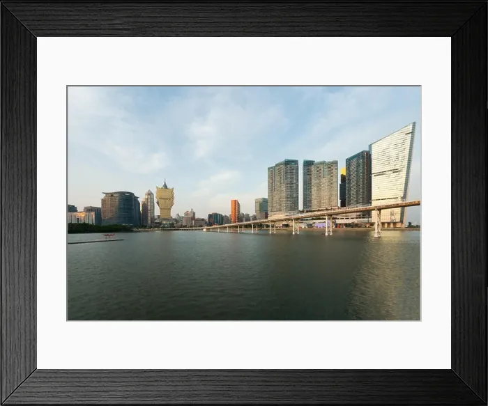 Framed Print : Image of Macau (Macao), China. Skyscraper hotel and casino building at downtown in Macau (Macao). Asian tourism, modern city life, or business finance Framed Print : Image of Macau (Macao), China. Skyscraper hotel and casino building at downtown in Macau (Macao). Asian tourism, modern city life, or business finance