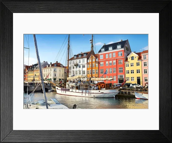 Framed Print : Copenhagen old town, Denmark - the ships moored in Nyhavn Canal Framed Print : Copenhagen old town, Denmark - the ships moored in Nyhavn Canal