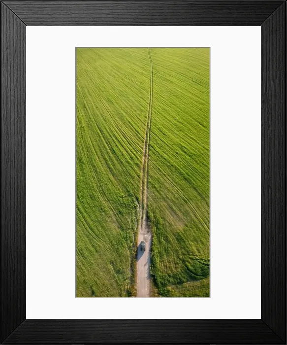 Framed Print : Aerial view of car SUV parked near countryside road in field rural landscape. Aerial view of car SUV parked near countryside road in summer field Framed Print : Aerial view of car SUV parked near countryside road in field rural landscape. Aerial view of car SUV parked near countryside road in summer field