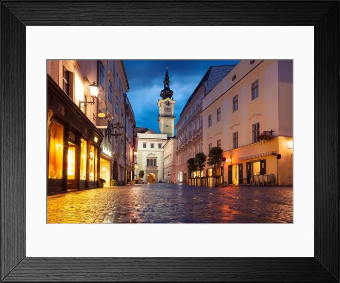 Framed Print : Linz, Austria. Cityscape image of old town Linz, Austria during twilight blue hour with reflection of the city lights Framed Print : Linz, Austria. Cityscape image of old town Linz, Austria during twilight blue hour with reflection of the city lights