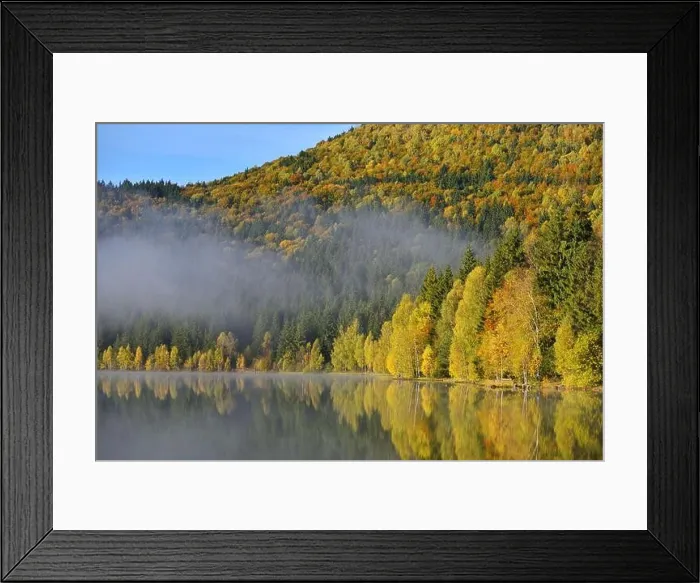 Framed Print : Autumn landscape in the mountains with trees reflecting in the water at St. Ana's lake, Romania Framed Print : Autumn landscape in the mountains with trees reflecting in the water at St. Ana's lake, Romania