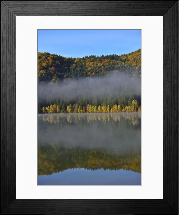 Framed Print : Autumn landscape in the mountains with trees reflecting in the water at St. Ana's lake, Romania Framed Print : Autumn landscape in the mountains with trees reflecting in the water at St. Ana's lake, Romania