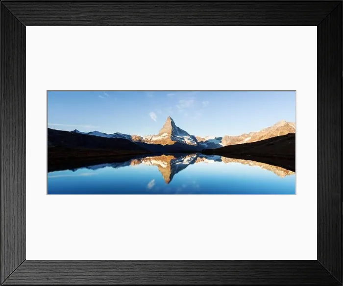 Framed Print : Picturesque landscape with colorful sunrise on Stellisee lake. Snowy Matterhorn Cervino peak with reflection in clear water. Zermatt, Swiss Alps Framed Print : Picturesque landscape with colorful sunrise on Stellisee lake. Snowy Matterhorn Cervino peak with reflection in clear water. Zermatt, Swiss Alps