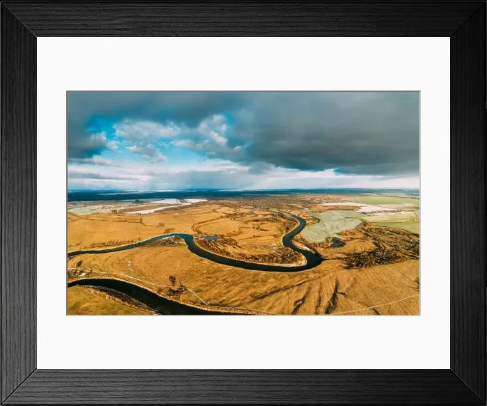 Framed Print : Belarus. Aerial View Of Dry Grass And Partly Frozen Curved River Landscape In Late Autumn Day. High Attitude View. Marsh Bog. Drone View. Bird's Eye V Framed Print : Belarus. Aerial View Of Dry Grass And Partly Frozen Curved River Landscape In Late Autumn Day. High Attitude View. Marsh Bog. Drone View. Bird's Eye V