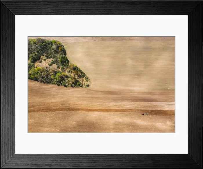 Framed Print : Tractor Plowing Field In Spring. Beginning Of Agricultural Season. Cultivator Pulled By A Tractor In Countryside Rural Field. Countryside Field Framed Print : Tractor Plowing Field In Spring. Beginning Of Agricultural Season. Cultivator Pulled By A Tractor In Countryside Rural Field. Countryside Field