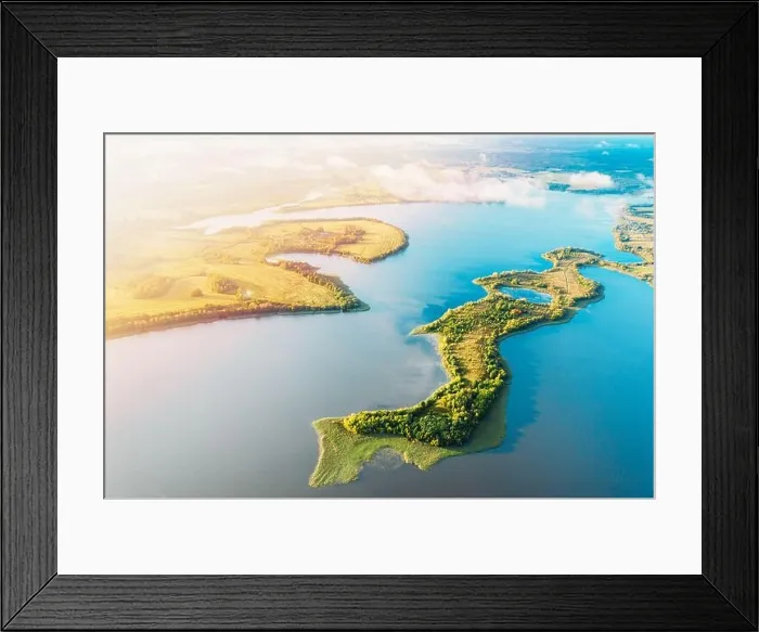 Framed Print : Amazing Scenic Aerial Bright Sunbeams View Green Meadow And River Landscape In Sunny Spring Day. Top View Of European Nature From High Attitude In