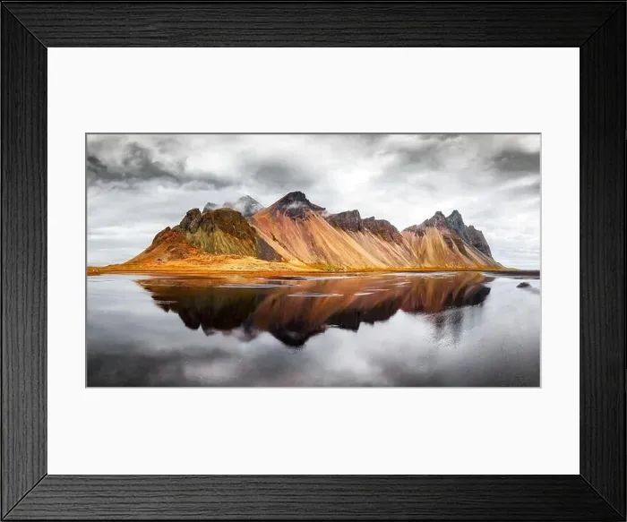 Framed Print : Gorgeous landscape of the famous Stokksnes mountains on Vestrahorn cape. Reflection in the clear water on the epic skies background, Iceland Framed Print : Gorgeous landscape of the famous Stokksnes mountains on Vestrahorn cape. Reflection in the clear water on the epic skies background, Iceland