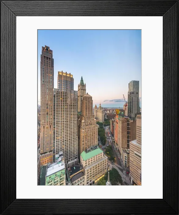 Framed Print : New York, New York, USA cityscape over Broadway in Lower Manhattan at twilight Framed Print : New York, New York, USA cityscape over Broadway in Lower Manhattan at twilight