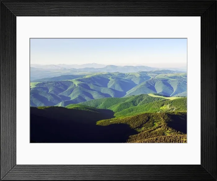 Framed Print : Green mountains range in summer time. Breathtaking view on hills covered by lush forest. Landscape photography Framed Print : Green mountains range in summer time. Breathtaking view on hills covered by lush forest. Landscape photography