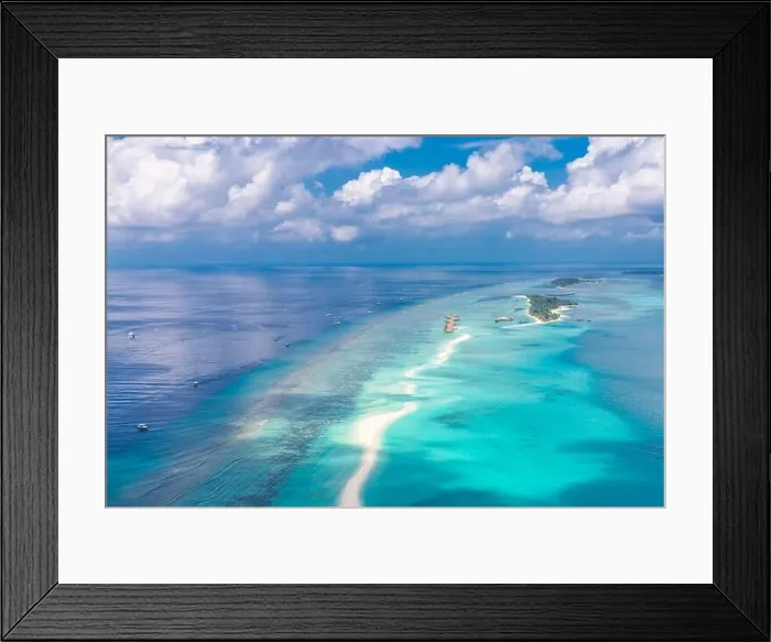 Framed Print : Aerial view on Maldives island. Luxury water and beach villas, bungalows with amazing nature seascape landscape. Luxury travel and vacation Framed Print : Aerial view on Maldives island. Luxury water and beach villas, bungalows with amazing nature seascape landscape. Luxury travel and vacation