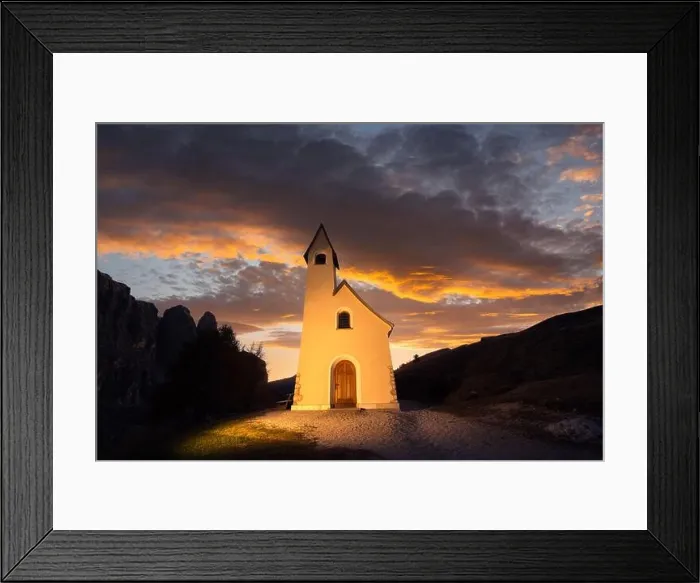 Framed Print : Gorgeus view on small iIlluminated chapel - Kapelle Ciapela on Gardena Pass, Italian Dolomites mountains. Golden sunset light on background Framed Print : Gorgeus view on small iIlluminated chapel - Kapelle Ciapela on Gardena Pass, Italian Dolomites mountains. Golden sunset light on background