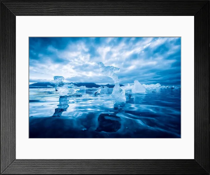 Framed Print : Icebergs in Jokulsarlon glacial lagoon. Vatnajokull National Park, southeast Iceland, Europe. Landscape photography. Tonned by blue filter Framed Print : Icebergs in Jokulsarlon glacial lagoon. Vatnajokull National Park, southeast Iceland, Europe. Landscape photography. Tonned by blue filter