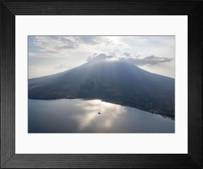 Framed Print : Late afternoon sunlight illuminates the Iliape volcano found just east of Flores, Indonesia. This tropical area is part of the famous Ring of Fire