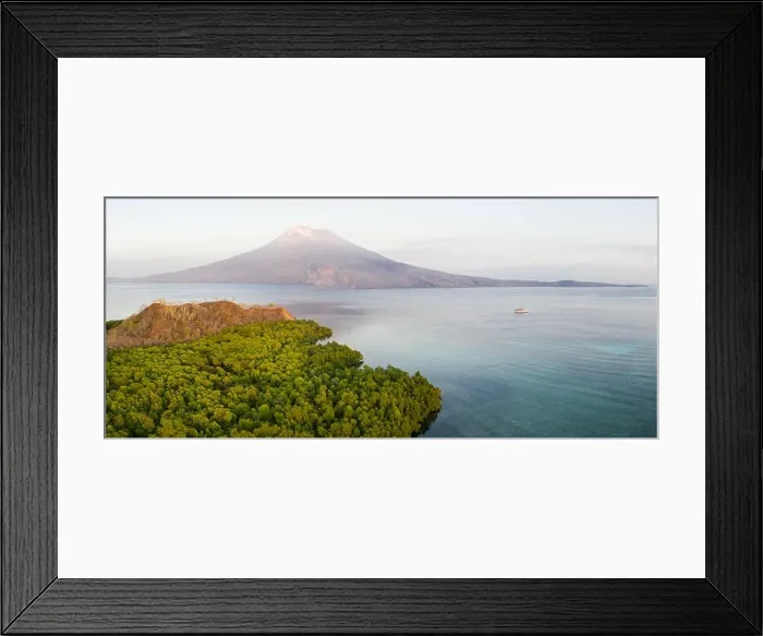 Framed Print : Sunrise illuminates the Iliape volcano found just east of Flores, Indonesia. This tropical area is part of the famous Ring of Fire Framed Print : Sunrise illuminates the Iliape volcano found just east of Flores, Indonesia. This tropical area is part of the famous Ring of Fire