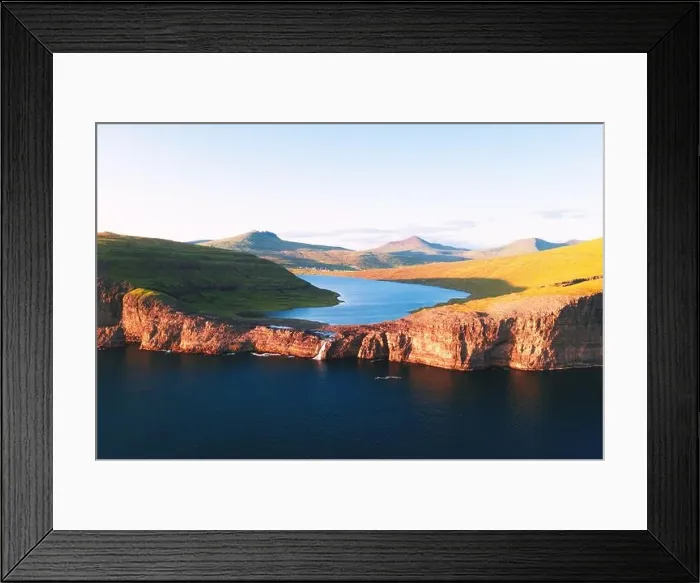 Framed Print : Aerial view from drone of Sorvagsvatn lake on cliffs of Vagar island in sunset time, Faroe Islands, Denmark. Landscape photography Framed Print : Aerial view from drone of Sorvagsvatn lake on cliffs of Vagar island in sunset time, Faroe Islands, Denmark. Landscape photography