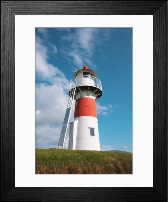 Framed Print : Old lighthouse outside Torshavn city against clear blue sky, Faroe Islands, Denmark Framed Print : Old lighthouse outside Torshavn city against clear blue sky, Faroe Islands, Denmark