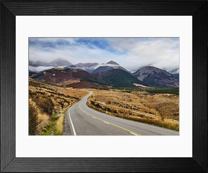 Framed Print : Mountain landscape with road and cloudy sky, Arthur's Pass, Southern Alps, New Zealand Framed Print : Mountain landscape with road and cloudy sky, Arthur's Pass, Southern Alps, New Zealand