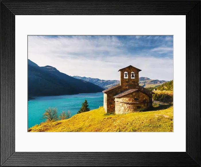 Framed Print : Sunny picturesque view of stone chapel on Roselend lake (Lac de Roselend) in France Alps (Auvergne-Rhone-Alpes). Landscape photography Framed Print : Sunny picturesque view of stone chapel on Roselend lake (Lac de Roselend) in France Alps (Auvergne-Rhone-Alpes). Landscape photography