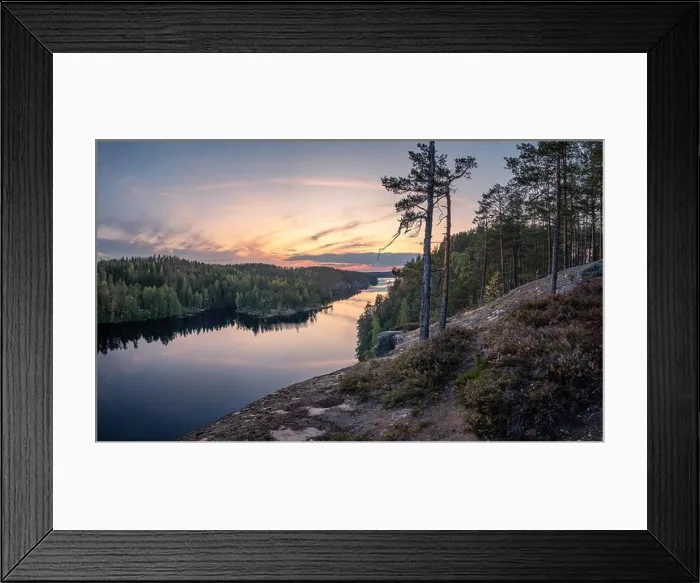 Framed Print : Scenic forest landscape with tranquil mood and idyllic sunset at summer evening in Finland Framed Print : Scenic forest landscape with tranquil mood and idyllic sunset at summer evening in Finland