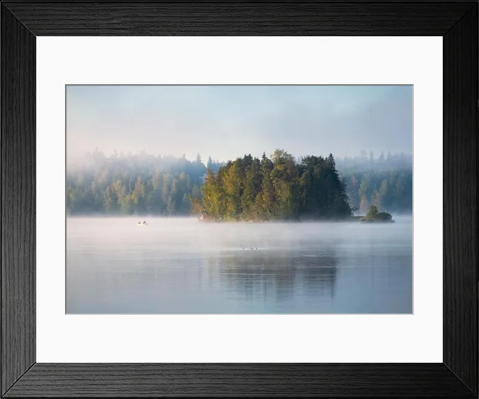 Framed Print : Misty landscape with fisherman and beautiful morning light at mood summer morning in Finland Framed Print : Misty landscape with fisherman and beautiful morning light at mood summer morning in Finland