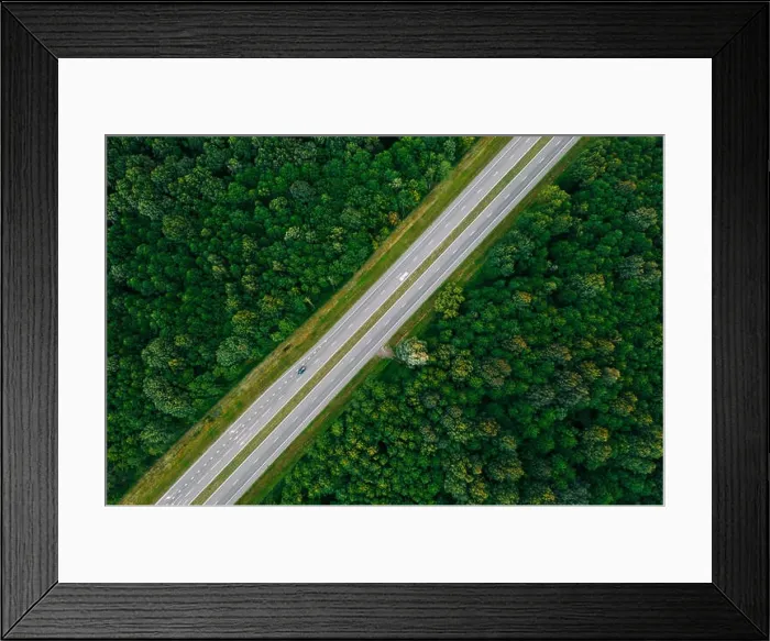 Framed Print : Aerial View Of Highway Road Through Green Forest Landscape In Summer. Top View Flat View Of Highway Motorway Freeway From High Attitude. Trip And Trav Framed Print : Aerial View Of Highway Road Through Green Forest Landscape In Summer. Top View Flat View Of Highway Motorway Freeway From High Attitude. Trip And Trav