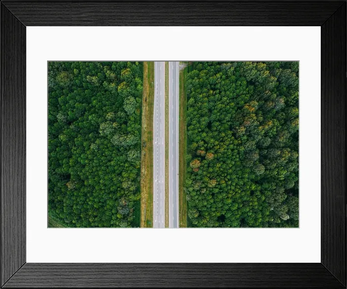 Framed Print : Aerial View Of Highway Road Through Green Forest Landscape In Summer. Top View Flat View Of Highway Motorway Freeway From High Attitude. Trip And Trav Framed Print : Aerial View Of Highway Road Through Green Forest Landscape In Summer. Top View Flat View Of Highway Motorway Freeway From High Attitude. Trip And Trav