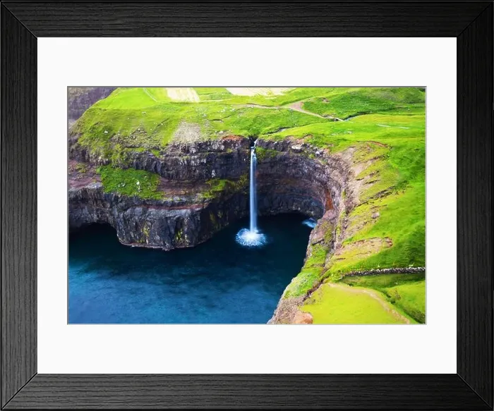 Framed Print : Closeup view of Mulafossur waterfall in Gasadalur village, Vagar Island of the Faroe Islands, Denmark. Landscape photography Framed Print : Closeup view of Mulafossur waterfall in Gasadalur village, Vagar Island of the Faroe Islands, Denmark. Landscape photography