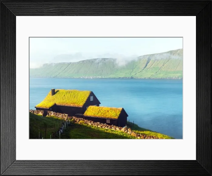 Framed Print : Foggy morning view of a house with grass roof in the Velbastadur village on Streymoy island, Faroe islands, Denmark. Landscape photography Framed Print : Foggy morning view of a house with grass roof in the Velbastadur village on Streymoy island, Faroe islands, Denmark. Landscape photography