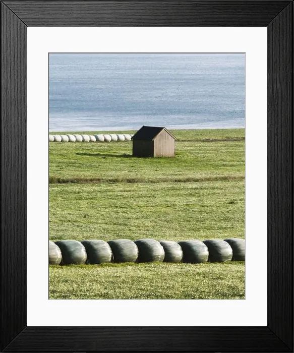 Framed Print : Rural scene with farm field and hay stacks on the Faroe Islands Framed Print : Rural scene with farm field and hay stacks on the Faroe Islands