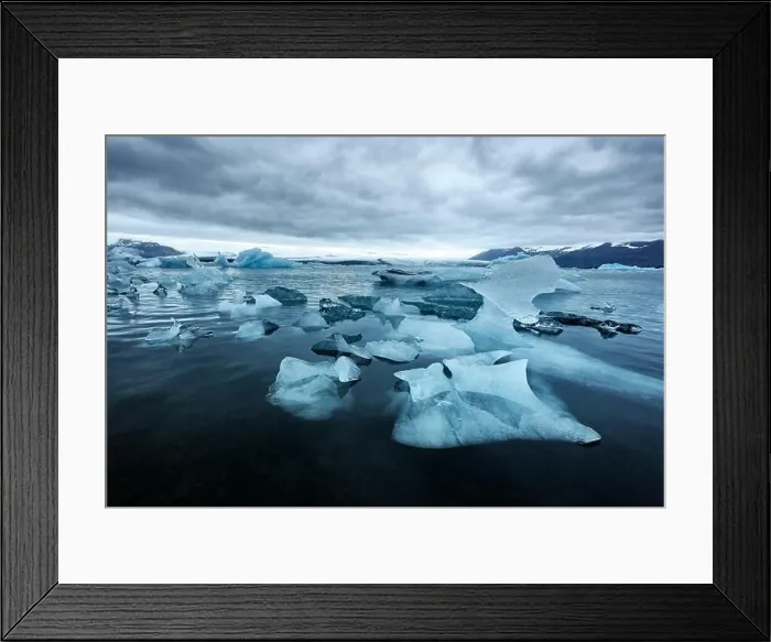 Framed Print : Incredible evening landscape with floating icebergs in Jokulsarlon glacier lagoon, Iceland Framed Print : Incredible evening landscape with floating icebergs in Jokulsarlon glacier lagoon, Iceland