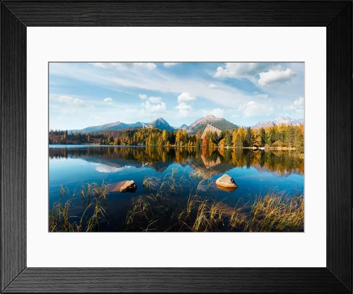 Framed Print : Dramatic cloudy sky under orange larch forest. Mountain lake Strbske pleso in National Park High Tatra, Slovakia, Europe Framed Print : Dramatic cloudy sky under orange larch forest. Mountain lake Strbske pleso in National Park High Tatra, Slovakia, Europe