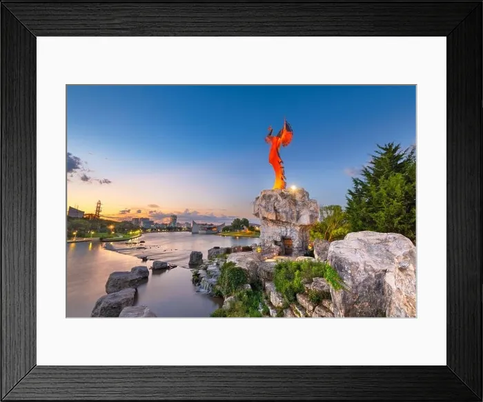 Framed Print : WICHITA, KANSAS - AUGUS 31, 2018: The confluence of the Arkansas and Little Arkansas River at the Keeper of the Plains near downtown Wichita at dawn Framed Print : WICHITA, KANSAS - AUGUS 31, 2018: The confluence of the Arkansas and Little Arkansas River at the Keeper of the Plains near downtown Wichita at dawn