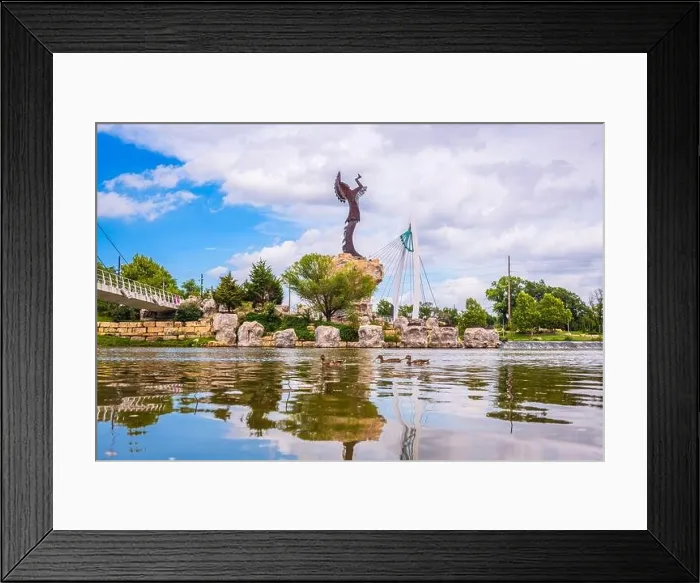 Framed Print : WICHITA, KANSAS - AUGUS 30, 2018: The confluence of the Arkansas and Little Arkansas River at the Keeper of the Plains near downtown Wichita Framed Print : WICHITA, KANSAS - AUGUS 30, 2018: The confluence of the Arkansas and Little Arkansas River at the Keeper of the Plains near downtown Wichita