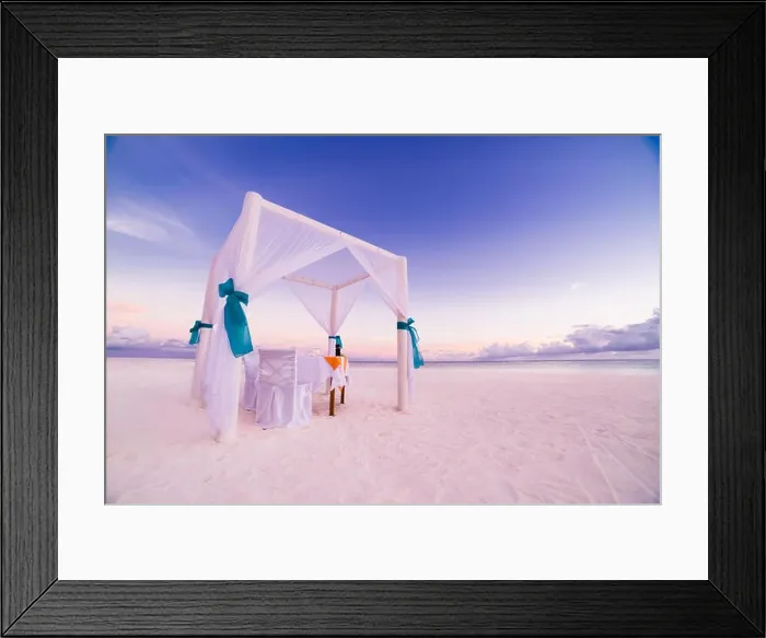 Framed Print : Romantic beach dinner set-up for honeymoon. Beach background concept Framed Print : Romantic beach dinner set-up for honeymoon. Beach background concept