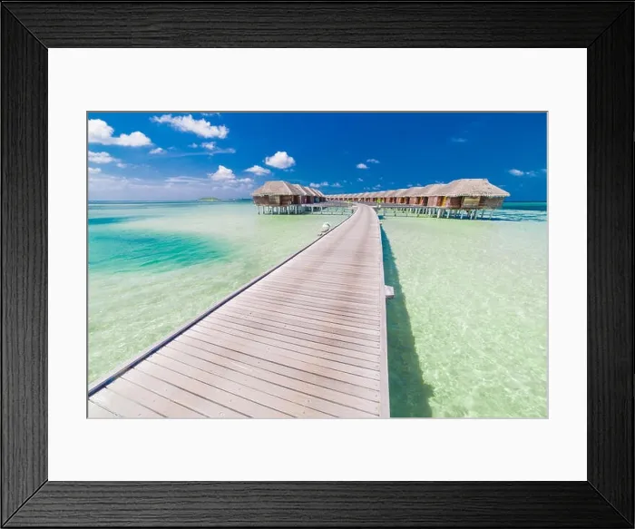 Framed Print : Overwater villas in Maldives, beach background Framed Print : Overwater villas in Maldives, beach background