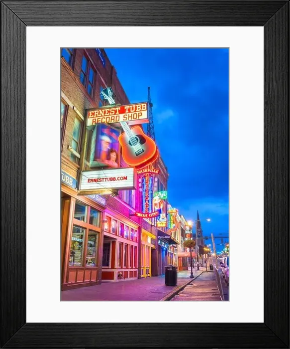 Framed Print : NASHVILLE, TENNESSEE - AUGUST 20, 2018: Honky-tonks on Lower Broadway. The district is famous for the numerous country music entertainment establishme Framed Print : NASHVILLE, TENNESSEE - AUGUST 20, 2018: Honky-tonks on Lower Broadway. The district is famous for the numerous country music entertainment establishme