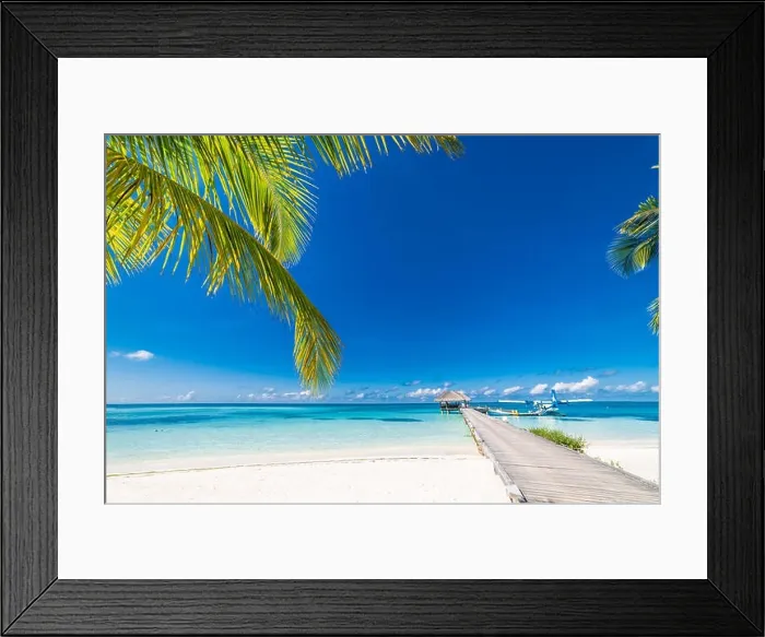 Framed Print : Amazing beach in Maldives with luxury water villas. Exotic background concept Framed Print : Amazing beach in Maldives with luxury water villas. Exotic background concept
