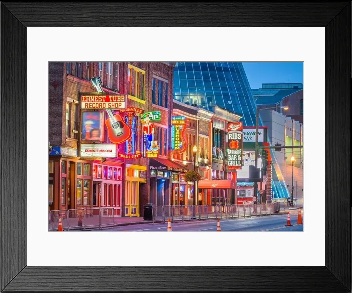 Framed Print : NASHVILLE, TENNESSEE - AUGUST 20, 2018: Honky-tonks on Lower Broadway. The district is famous for the numerous country music entertainment establishme Framed Print : NASHVILLE, TENNESSEE - AUGUST 20, 2018: Honky-tonks on Lower Broadway. The district is famous for the numerous country music entertainment establishme