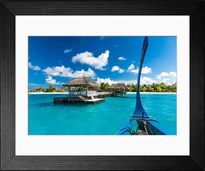 Framed Print : Beautiful beach with water bungalows at Maldives, view from the traditional boat Dhoni Framed Print : Beautiful beach with water bungalows at Maldives, view from the traditional boat Dhoni
