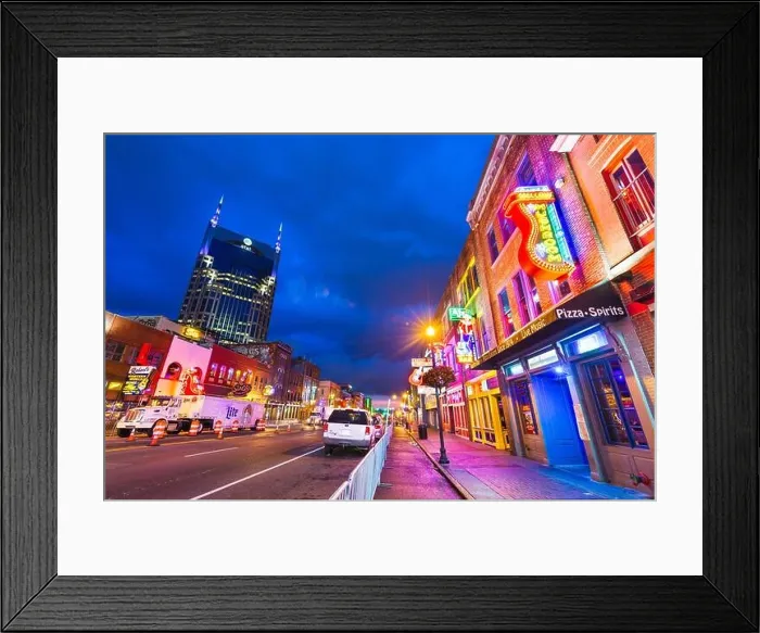 Framed Print : NASHVILLE, TENNESSEE - AUGUST 20, 2018: Honky-tonks on Lower Broadway. The district is famous for the numerous country music entertainment establishme Framed Print : NASHVILLE, TENNESSEE - AUGUST 20, 2018: Honky-tonks on Lower Broadway. The district is famous for the numerous country music entertainment establishme