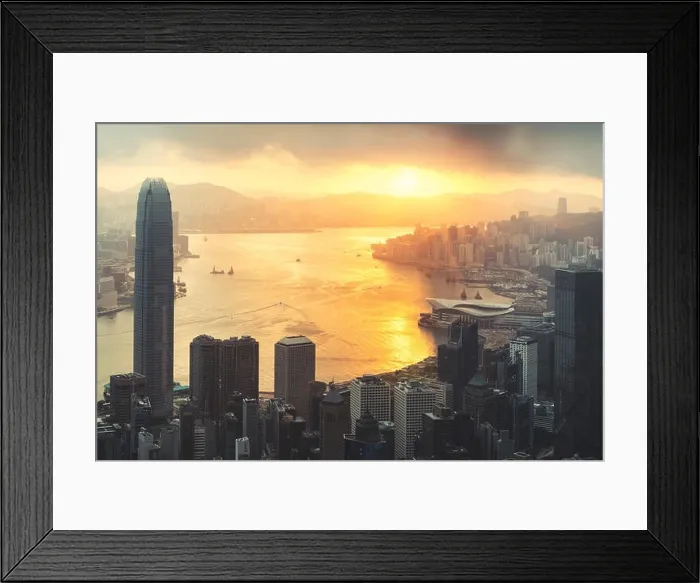 Framed Print : Sunrise over Hong Kong Victoria Harbor from Victoria Peak with Hong Kong and Kowloon below. Asian tourism, modern city life, or business finance and e Framed Print : Sunrise over Hong Kong Victoria Harbor from Victoria Peak with Hong Kong and Kowloon below. Asian tourism, modern city life, or business finance and e