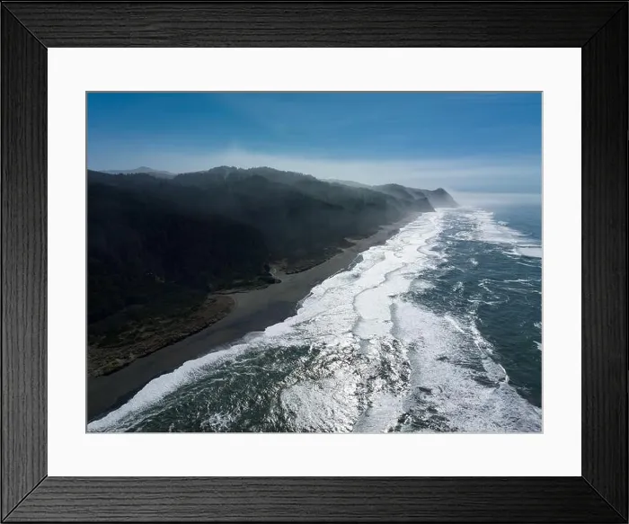 Framed Print : Afternoon sunlight shines on the Pacific Ocean washing onto Gold Beach along the scenic southern coast of Oregon. This area is along Highway 101 Framed Print : Afternoon sunlight shines on the Pacific Ocean washing onto Gold Beach along the scenic southern coast of Oregon. This area is along Highway 101