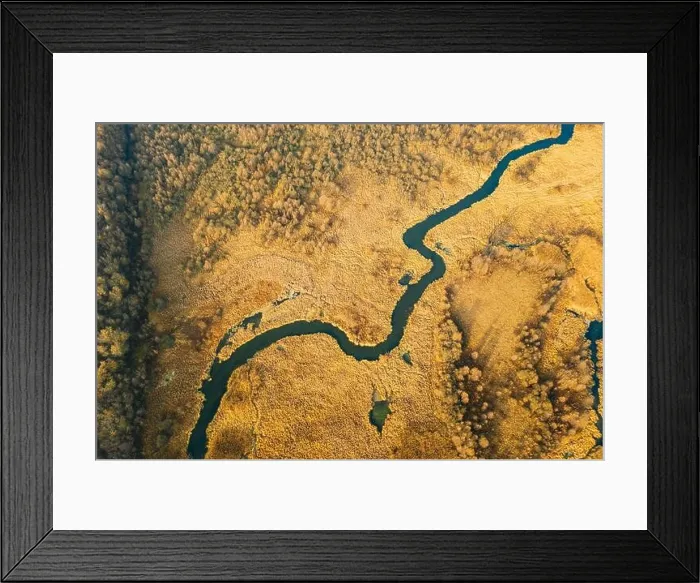 Framed Print : Belarus. Aerial View Of Dry Grass And Partly Frozen Curved River Landscape In Late Autumn Day. High Attitude View. Marsh Bog. Drone View. Bird's Eye V Framed Print : Belarus. Aerial View Of Dry Grass And Partly Frozen Curved River Landscape In Late Autumn Day. High Attitude View. Marsh Bog. Drone View. Bird's Eye V