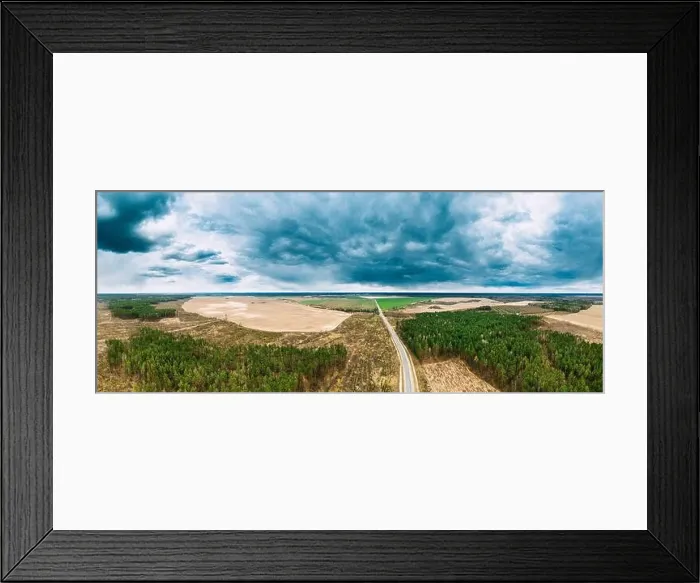 Framed Print : Aerial View Of Highway Road Through Deforestation Area Landscape. Green Pine Forest In Deforestation Zone. Top View Of Field And Forest Landscape. Dro Framed Print : Aerial View Of Highway Road Through Deforestation Area Landscape. Green Pine Forest In Deforestation Zone. Top View Of Field And Forest Landscape. Dro