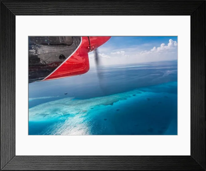 Framed Print : Aerial view from a seaplane on Maldives island Framed Print : Aerial view from a seaplane on Maldives island
