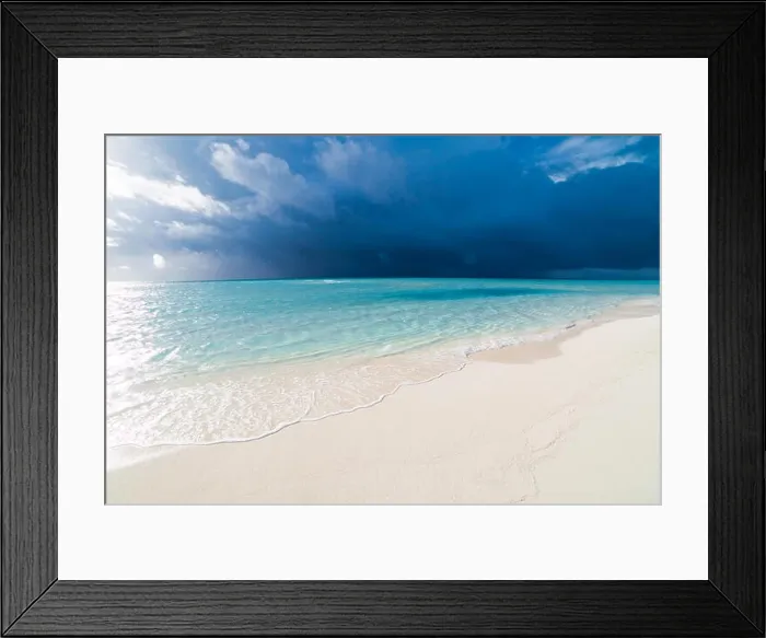 Framed Print : White tropical beach in Maldives with blue lagoon and a tropical storm Framed Print : White tropical beach in Maldives with blue lagoon and a tropical storm