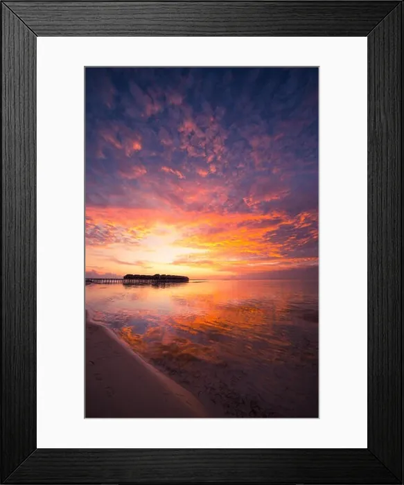 Framed Print : Amazing abstract background. Beautiful sunset colors in Maldives. Long jetty and luxury overwater villas Framed Print : Amazing abstract background. Beautiful sunset colors in Maldives. Long jetty and luxury overwater villas