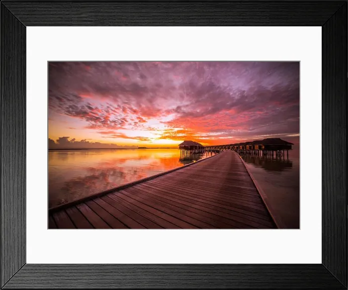 Framed Print : Amazing abstract background. Beautiful sunset colors in Maldives. Long jetty and luxury overwater villas Framed Print : Amazing abstract background. Beautiful sunset colors in Maldives. Long jetty and luxury overwater villas
